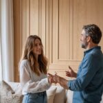 A couple enjoying a newly installed wood wall molding in their bedroom