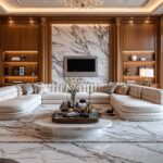 A stylish living room with custom interior millwork, elegant marble accents, and intricate wood paneling